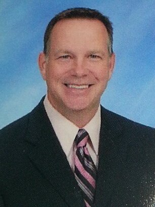 Coal City Middle School Principal. Interests include playing guitar, sports and coaching.