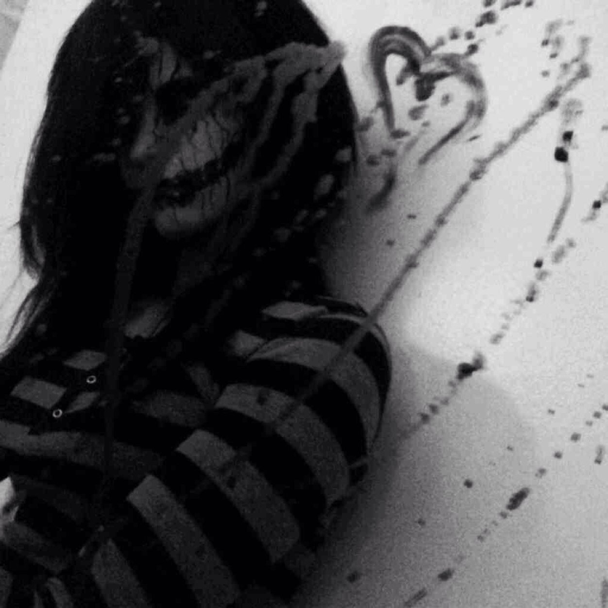 My smile can lure tainted humans in, But they soon become my pray. I am a feril child, it's true. But my daddy is Jeff The Killer, So what do you expect?