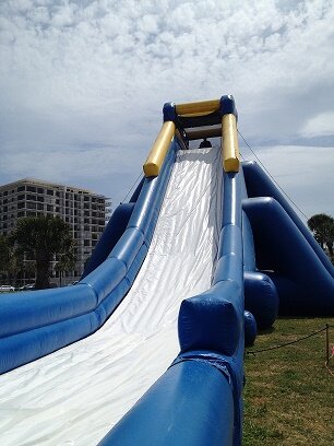 SurfSlide's profile picture. World's Largest Slip & Slide Fun for all ages ! Fischer park drive Cocoa Beach Florida
