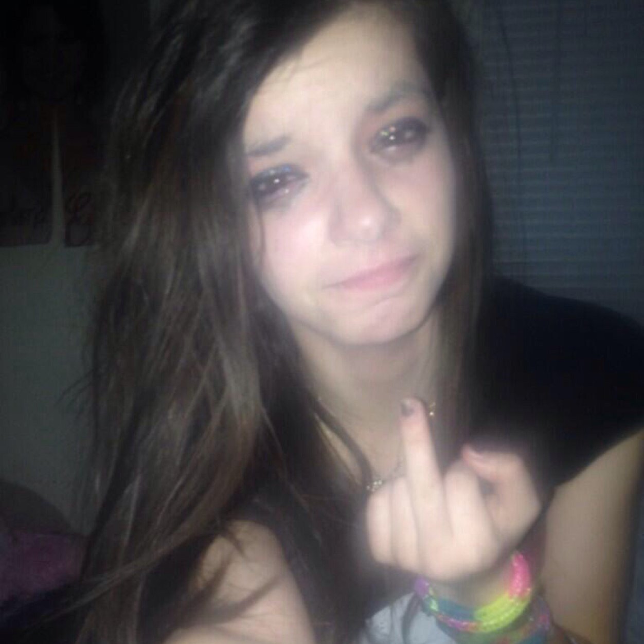 Janelle is an emo wannabe annoying lil bitch who slits her wrist