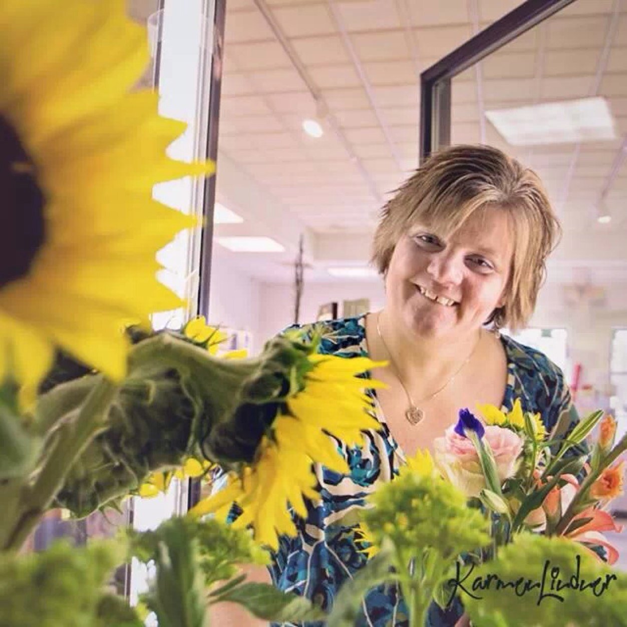 Floral owner, wife, mom, cookbook addict, bacon and coffee snob, Jesus girl, big-time dreamer, dream-fanner. Living life fully