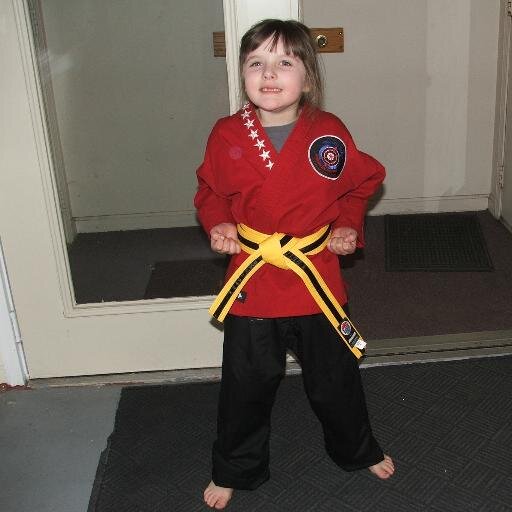 Mom of a wonderful little girl, black belt in kenpo, lover of a good book