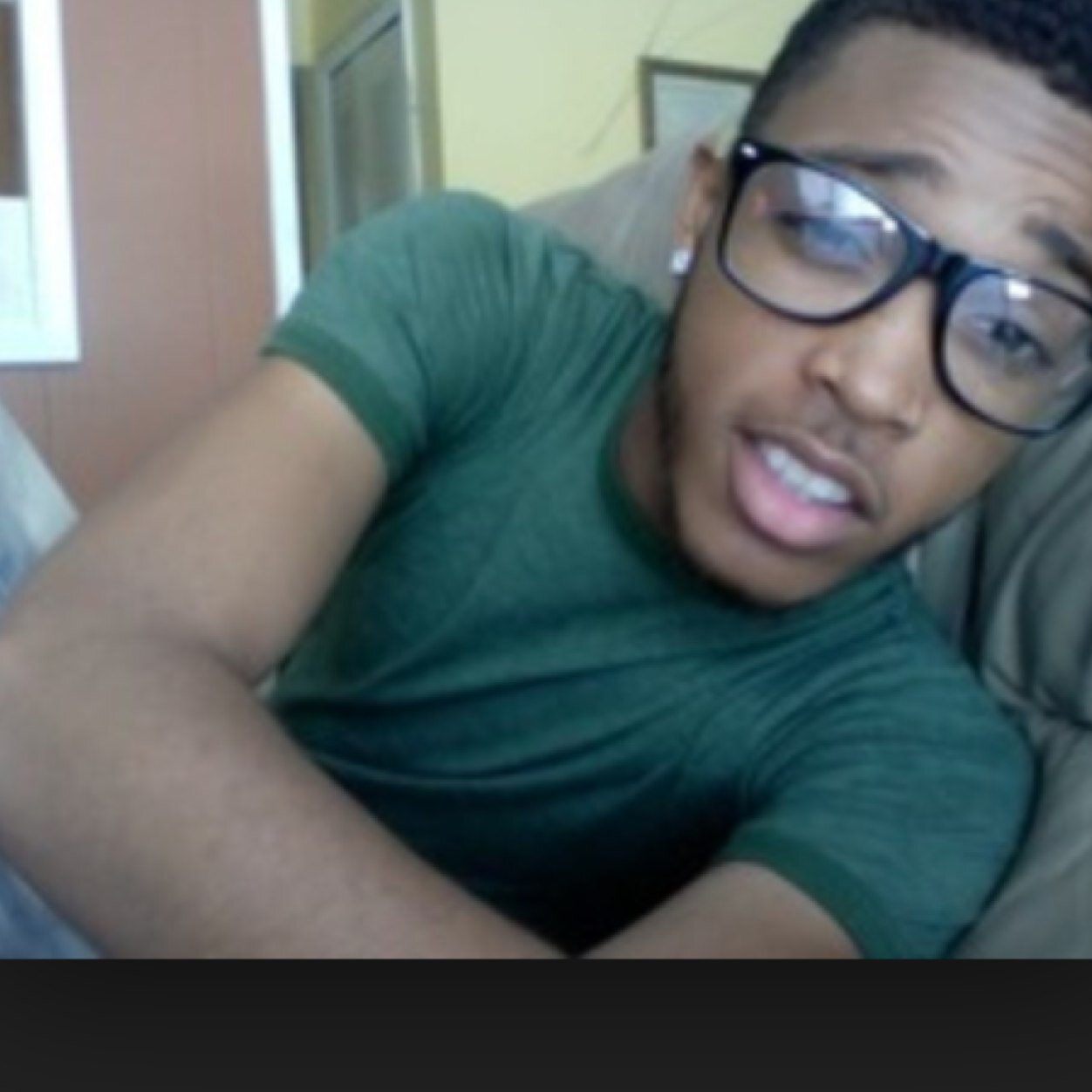 Webcam View Of Black Guy African American Man Waving His Hand Hello Sending Air Kiss Sitting Near By Jm