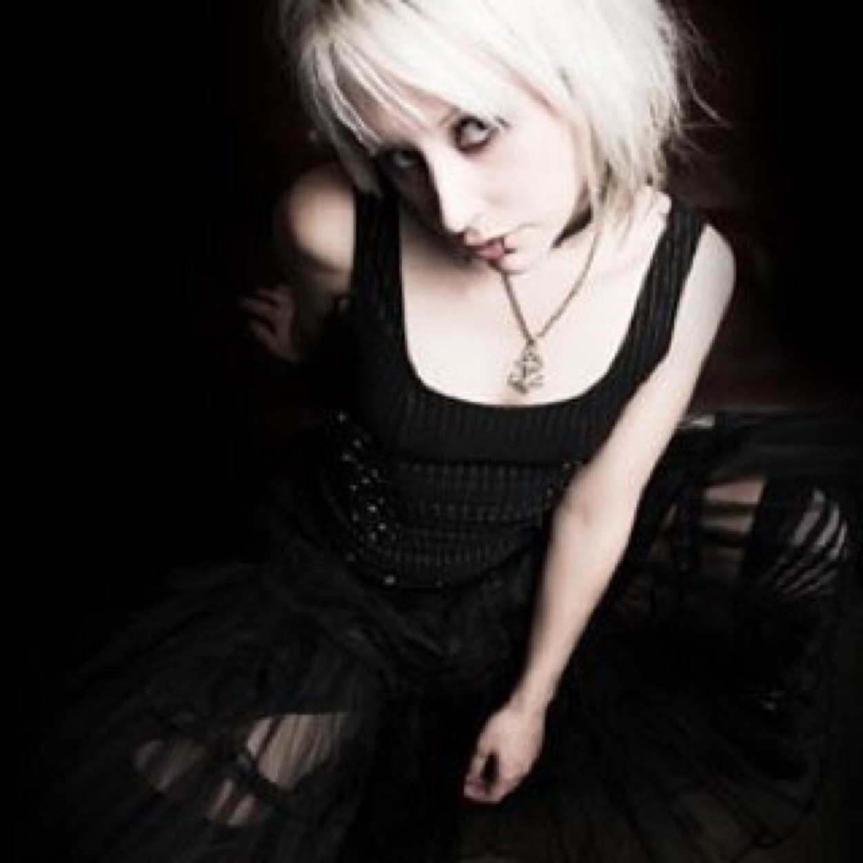 Alcoholic party girl who has a special talent to speak with those who've passed. I'm not as shy as I was, A bit of an adrenalin junky too.