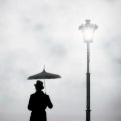 Every street lamp that I pass beats like a fatalistic drum