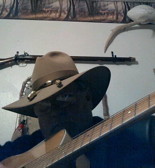 Fisherman, Grandfather, Great Grandfather, Dogfather, Raven whisperer, and everything else outdoors.........and a little picking and singing indoors!
