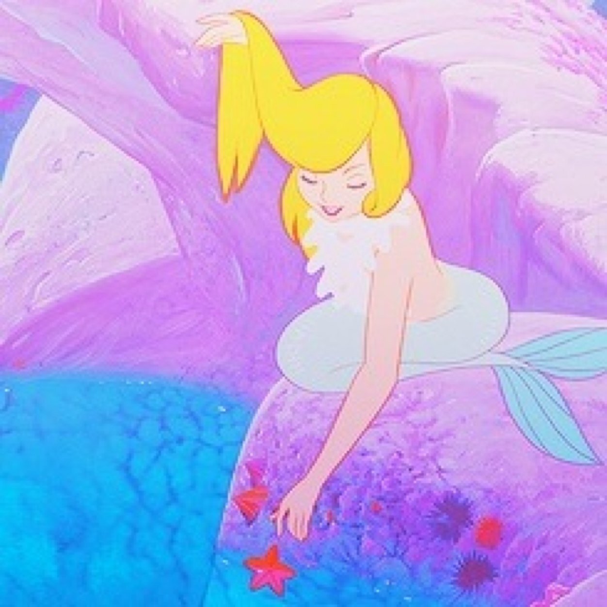 I'll think of a mermaid lagoon underneath a magic moon