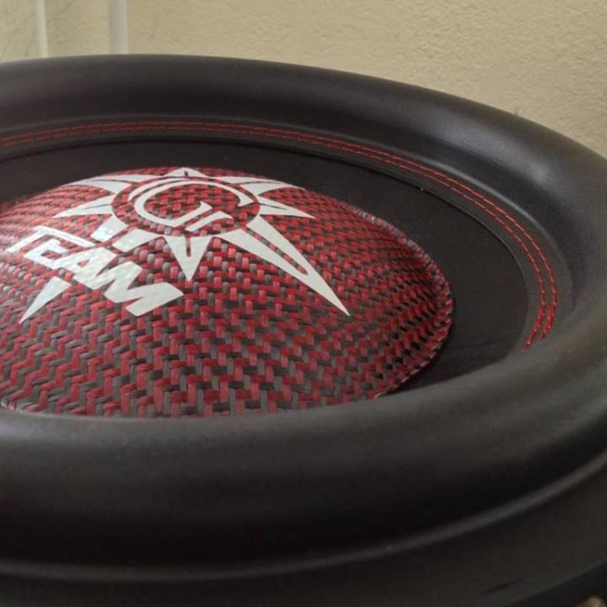 Genesis Custom Audio. Custom Carbon Fiber & Kevlar Dust Caps hand made in the USA.