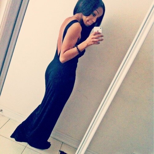 KarnaRobertet's profile picture. Put your boobs back in your shirt, smile instead of doing that duck face and put your middle finger down. Have some self-respect.