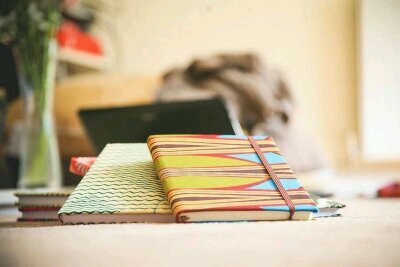 CollectionsbyIMEK uses Nigerian fabrics to make handmade, quality notebooks.