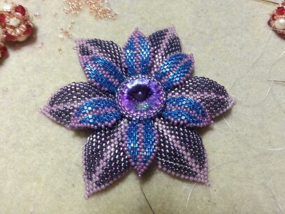 One of a kind unique and colorful handmade custom beaded jewelry.