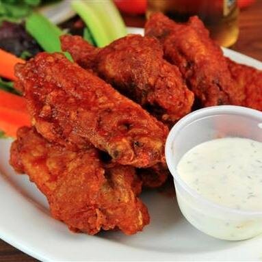 Laid-back, yorkville pub with wings voted best in TO, Gluten Free Options and amazing chicken salads for those who need healthy options.