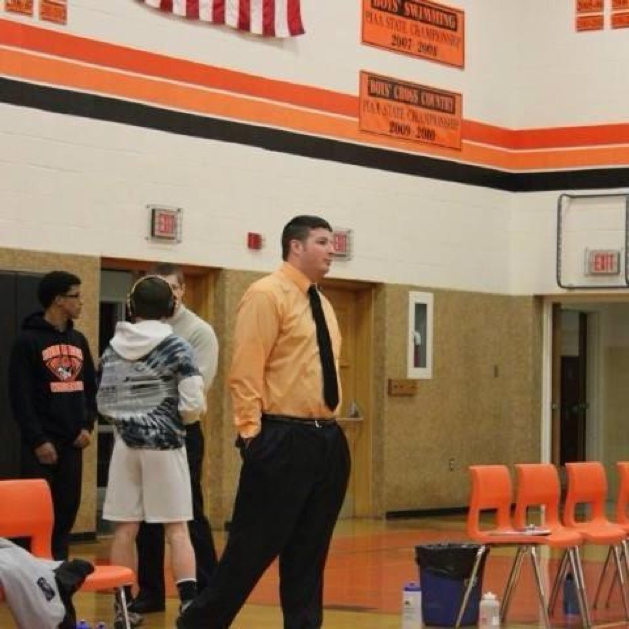 Former HS and college wrestler now coaching high school wrestling while finishing school