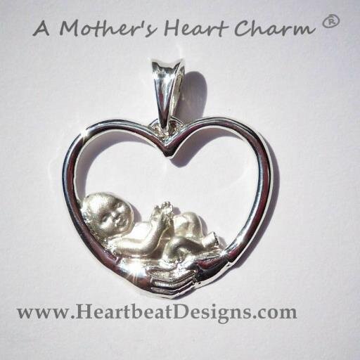 I'm a wife, mom, business owner, and designer of jewelry from the heart for mothers.