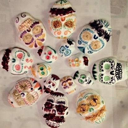 Handmade and hand-painted Sugar Skull bath bombs.