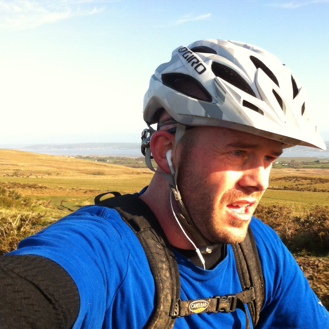 Probably lugging my arse up a hill on a bike