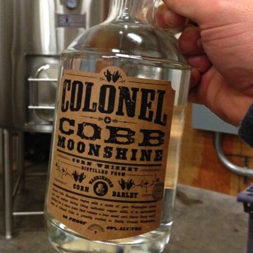 COLONEL COBB moonshine is a Double V Distillery premium craft spirit; distilled in Battle Ground, Washington, made with local and organic ingredients.