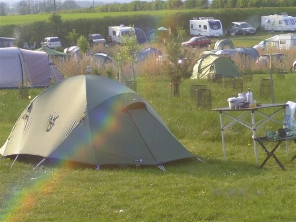 Field Barn Park is a tranquil Cotswolds campsite exclusively for over 30s nr Bourton-on-the-Water. Call 01451 820434 to book your perfect pitch.