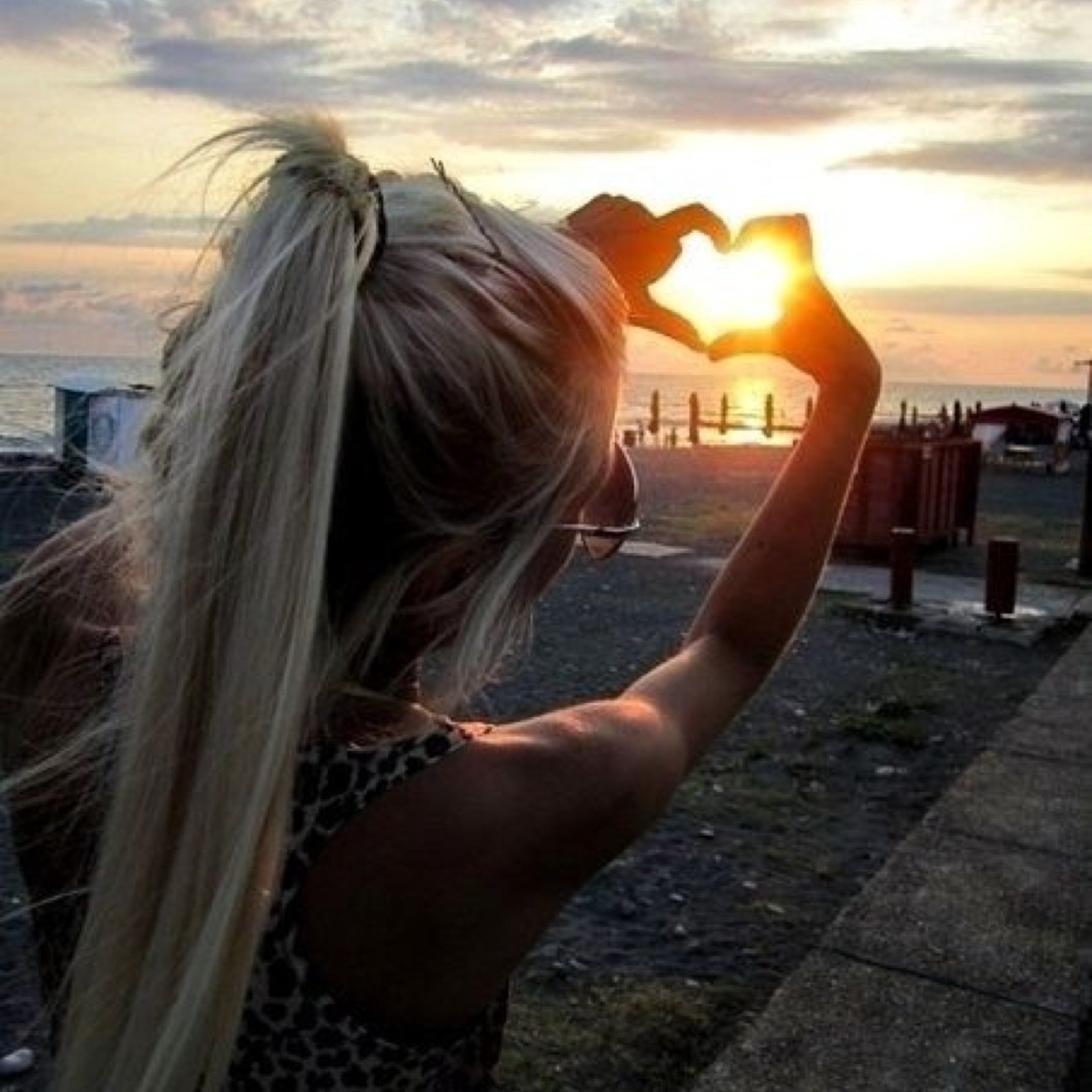 With her windows rolled down & her hair blown all around, she’s a hot southern mess. She’ll take a beer over white wine and a campfire over candle light :)