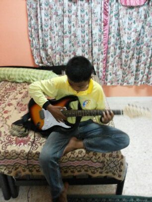 always happy... playing guitar every night :)