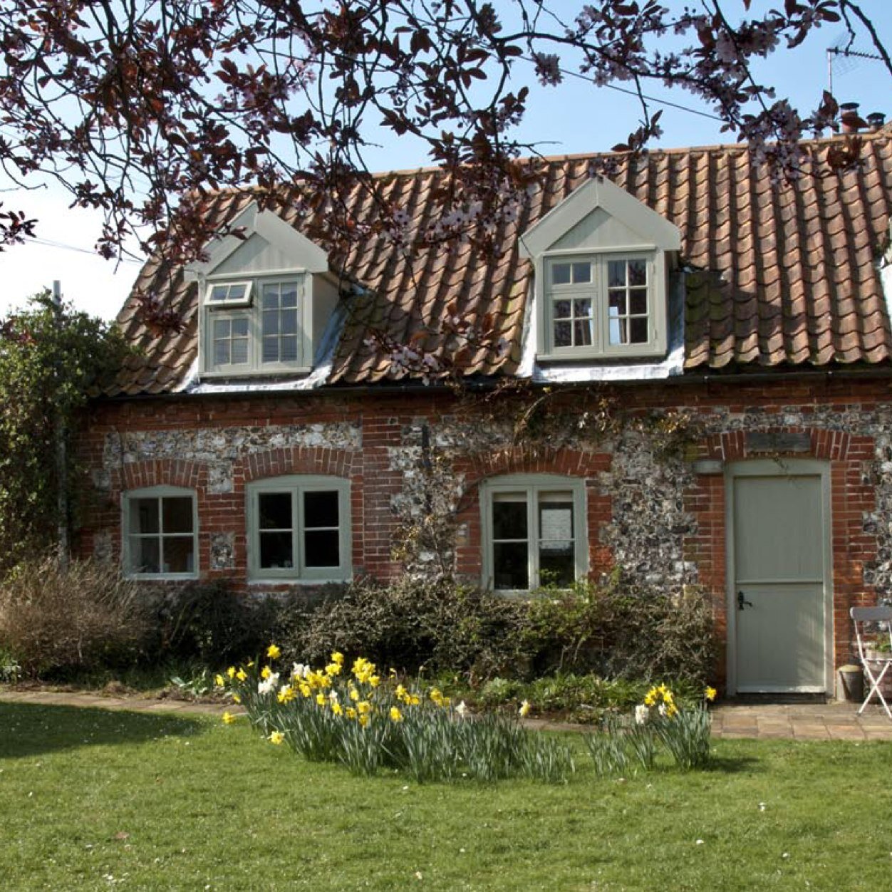 Sunny and spacious holiday cottage for four in a pretty village. Great base for exploring the coast and for amazing local food