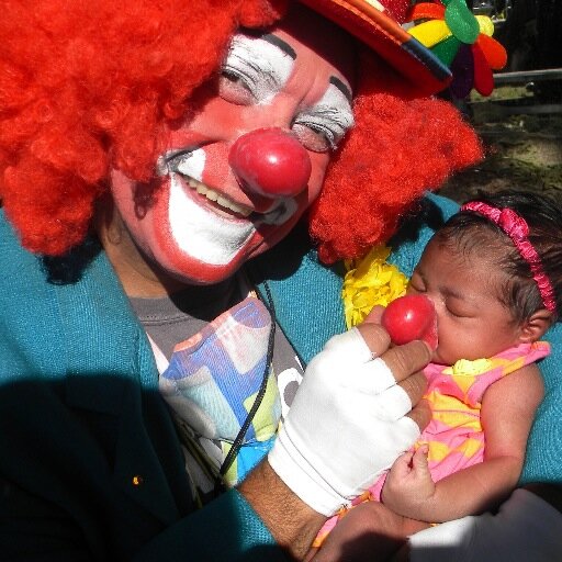 Raymond Trujillo a Dancer, Artist, Graphic Designer, Floral designer, and Mundin the Clown