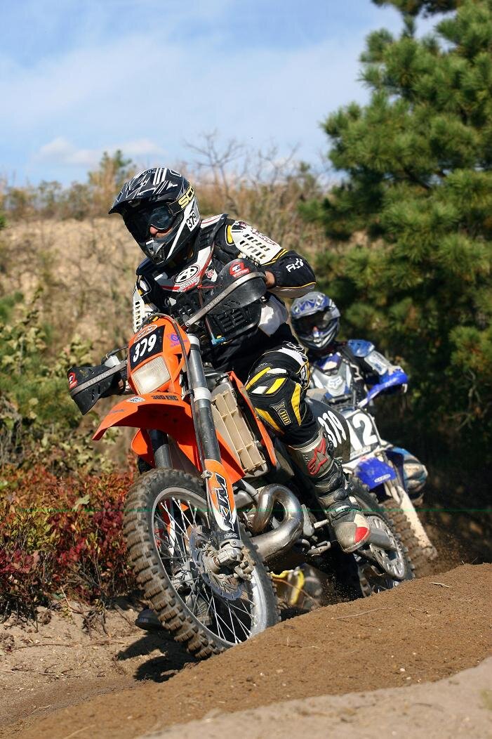 Rides the #779 KTM , Mazovian by birth American by choice, musical influences are Gene Krupa, Nigel Olssen and The 3 Stooges.