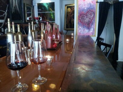 Join us for some delicious wine, Original artwork, and tasty dishes in our trendy & sexy atmosphere- bar/lounge/gallery- Now looking for artists!