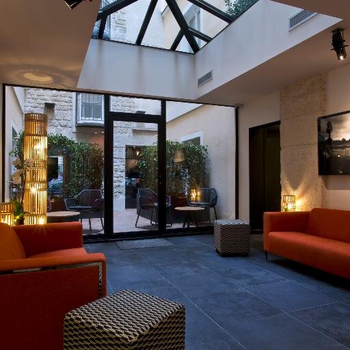 Hotel photo Gallery, chic and elegant, the Hotel ATMOSPHERES**** is ideally located in the heart of Paris.