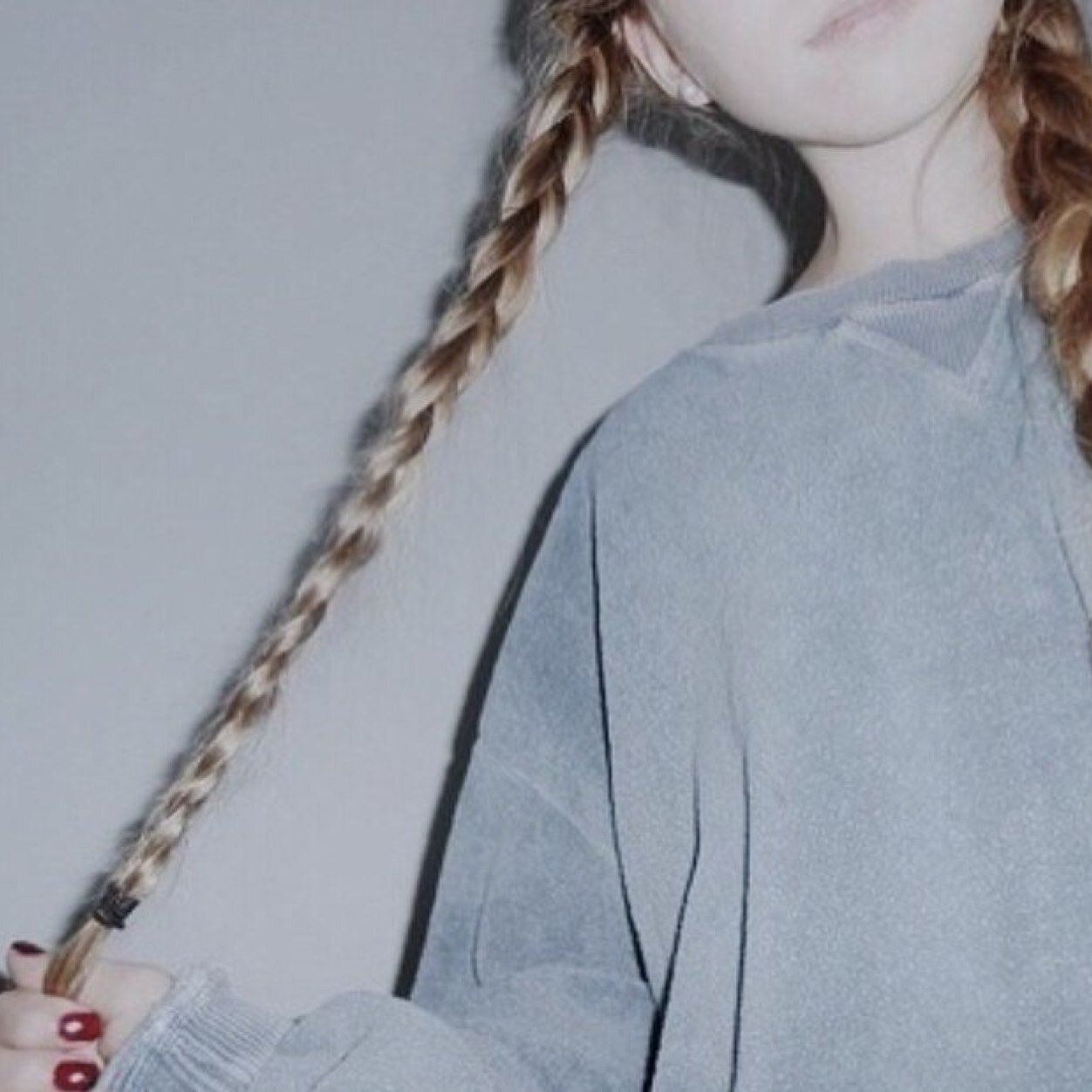 she is a web on which sadness stiches itself