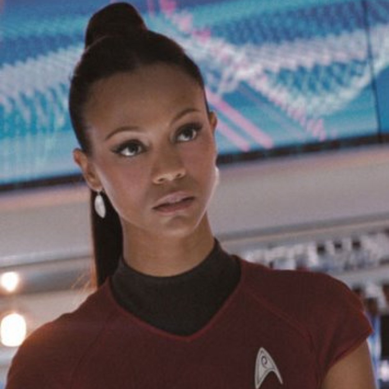 I'm a Lieutenant, and I serve as chief communications officer under Captain Kirk.