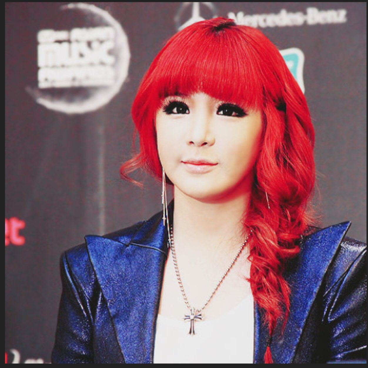 The girl with auburn hair. You are not worthy of my attention you freak.