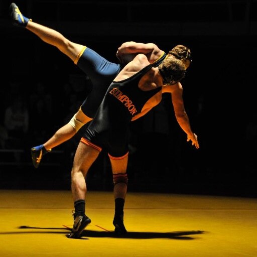wrestler, college student, fraternity brother. I'm either wearing a singlet or a bowtie.