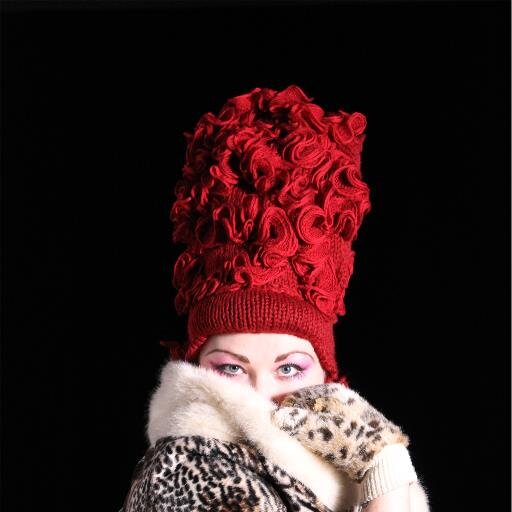 Gothic elegance and general dark witchery Illustrator of decadence and macabre, ​Ukulele Chanteuse, ​Knitter of costumes,  maker of puppets  and Face Painter