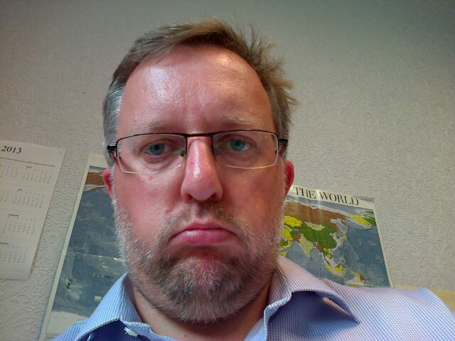 Husband. Dad. Rotund. Greying.