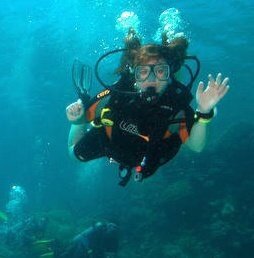 What do you get when you cross an Aggie with a Bobcat? A shark obsessed, SCUBA diving, outreach educator masquerading as a Lecturer at TXSTATE aka ME!
