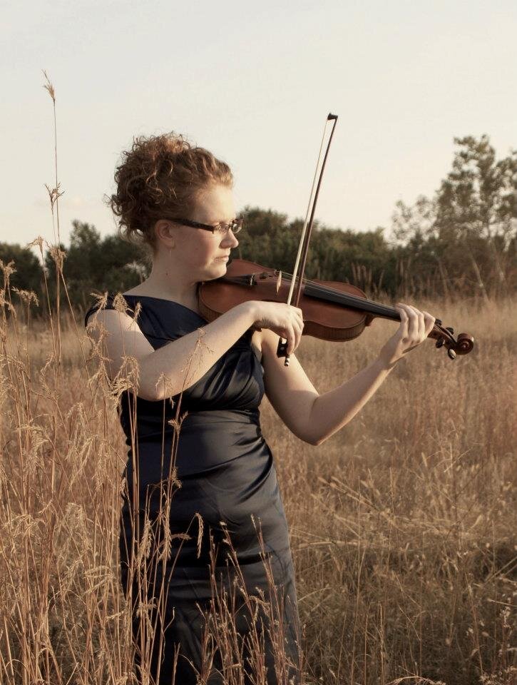 Boston based violinist passionate about performing music of living composers for a diverse audience.