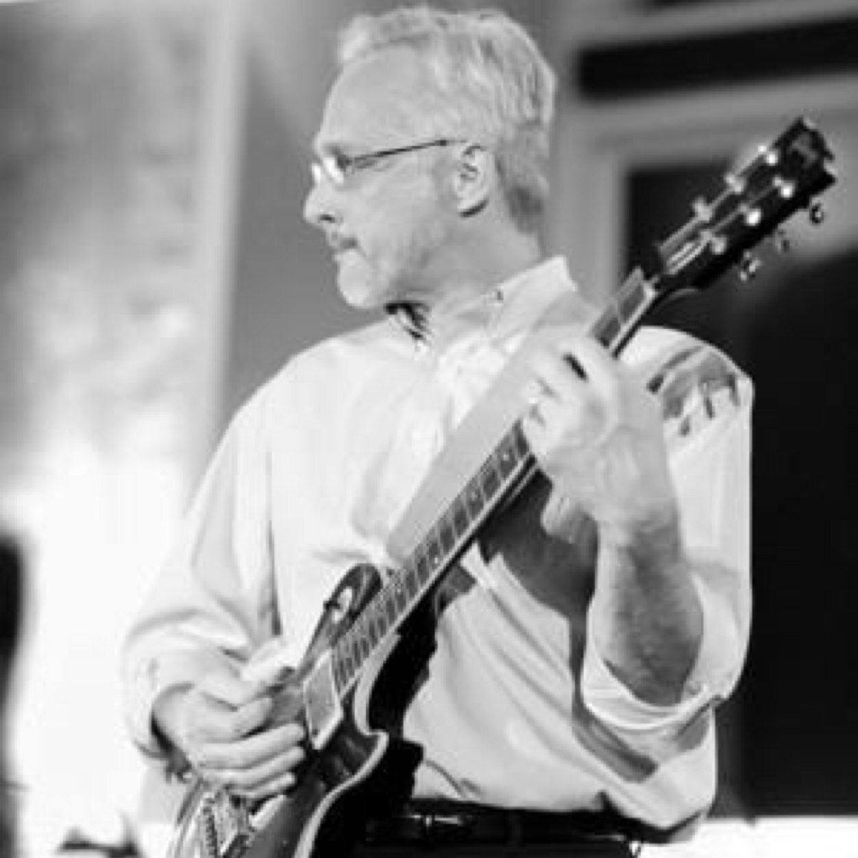 I write novels about really good extraterrestrials and I'm a rock guitarist.