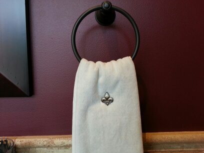 ToweLocs's profile picture. Don't let your towels slip away! Keep your hand and kitchen towels hanging where they belong. Decorate them with style while keeping your towels off the floor.