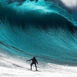 Lianna - surfer who tends to watch the bigger waves from shore these days while writing, teaching & guarding the ocean