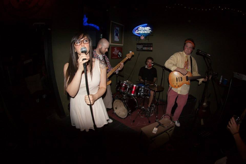 Bacon & Wine is a band from Raleigh. David Oldham: Guitar/lead vocals, Joy Perniciaro: Vocals/mandolin, Max Foley: Drums/vocals and Marshall Smith: Bass