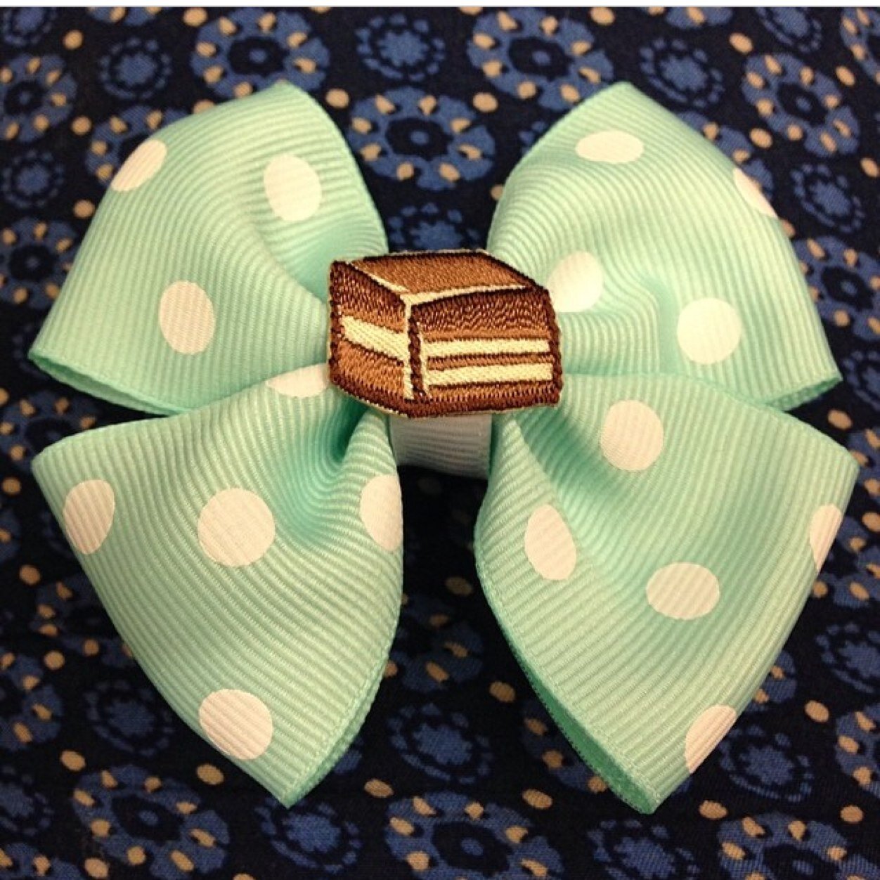tailormade bows, headbands, and dog bows.