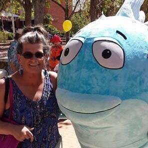 I am a school librarian and reading interventionist. Love to read, quilt and scrapbook. and I retired in June.  yea, more time to read,