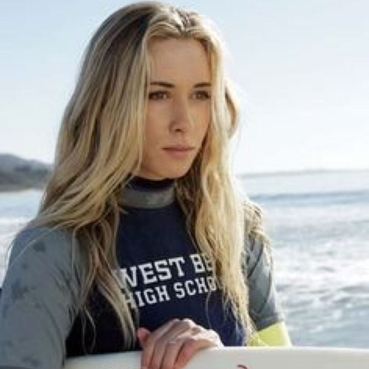 The surfer chick who would rather hang out with guys and be like a guy then be like a girl and hang with girls
