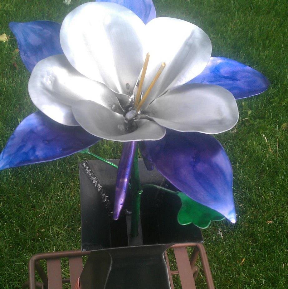 I am an artist who works in Metal creating unique #sculpture, wall hangings, lamps, and other #art using copper, aluminum, and steel.