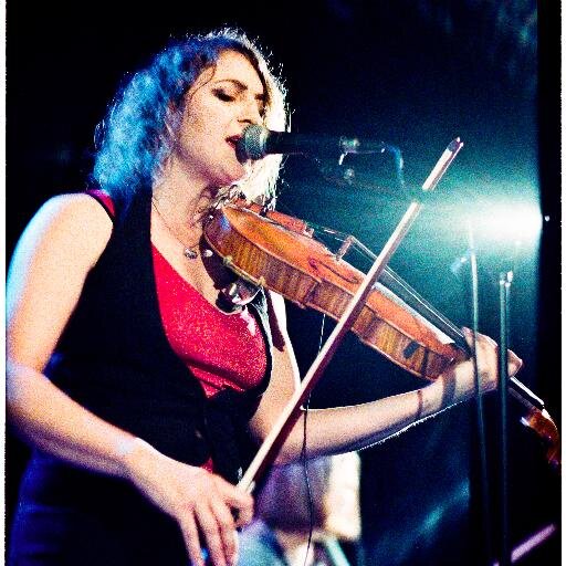 Viola and violin playing singer and composer