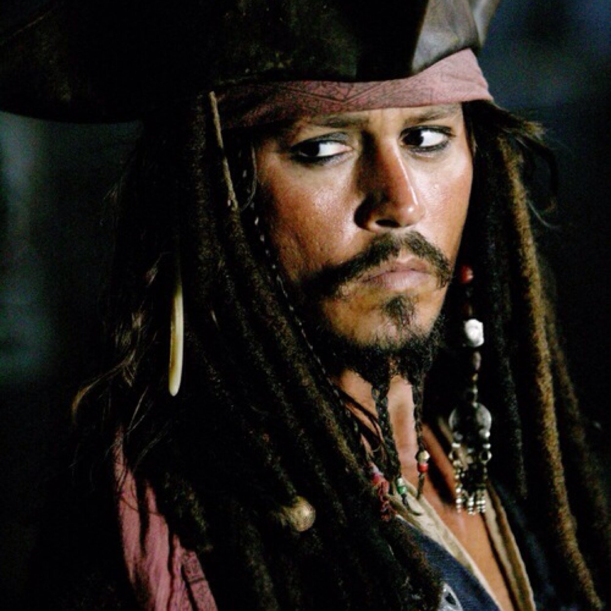 A gentleman of fortune, weasley scallywag, nuisance to the law and those who keep it, pirate-y half-drunken mild-grammar-obsessiveish scoundrel. Where's my rum?