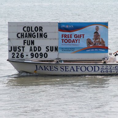 Your message is displayed on a 6' x 20' floating billboard just beyond the surf - reaching 100,000 viewers daily on 2.5 miles of beach.
