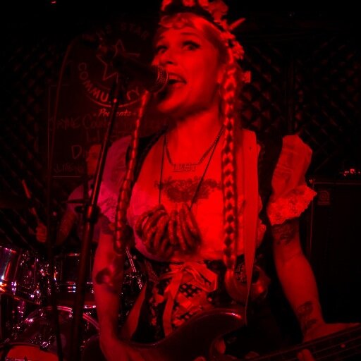 I make fun art in Blast-Off Burlesque, I rock and or roll, pug mom, wife of sexy bearded man, lover of the arts, I run, and generally practice silliness.