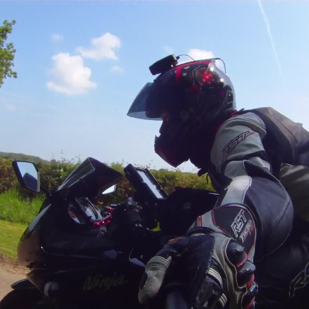 Motorcyclist. Vlogger. Angry guy.